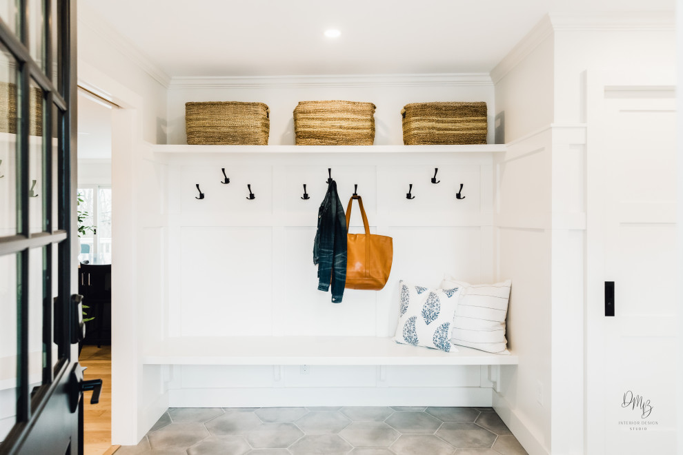 Traditional utility room in Other with an undermount sink, flat-panel cabinets, blue cabinets, quartz benchtops, white splashback, timber splashback, white walls, porcelain floors, a side-by-side washer and dryer, grey floor, white benchtop and wood walls.