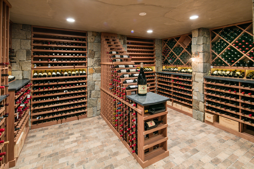 This is an example of an expansive rustic wine cellar in New York.