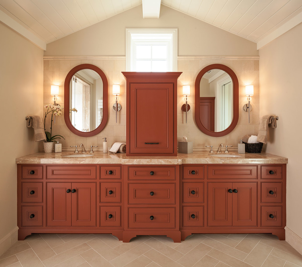 This is an example of a large transitional master bathroom in San Francisco with an undermount sink, beaded inset cabinets, red cabinets, marble benchtops, beige tile, stone tile, beige walls and porcelain floors.