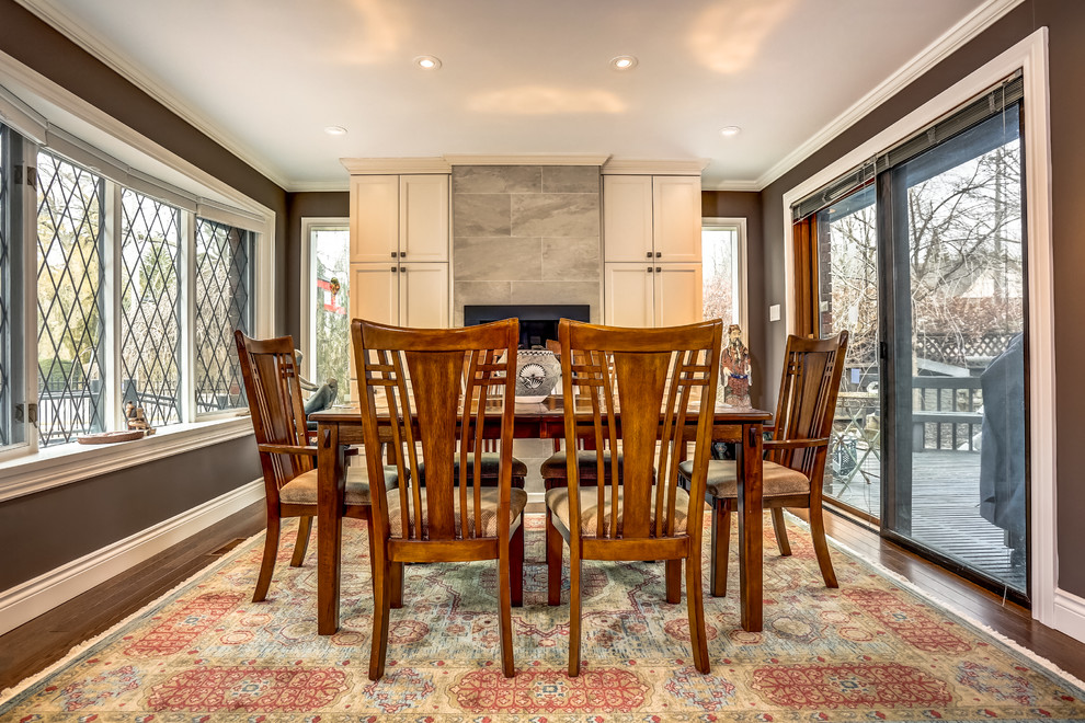 Example of a transitional dining room design in Toronto