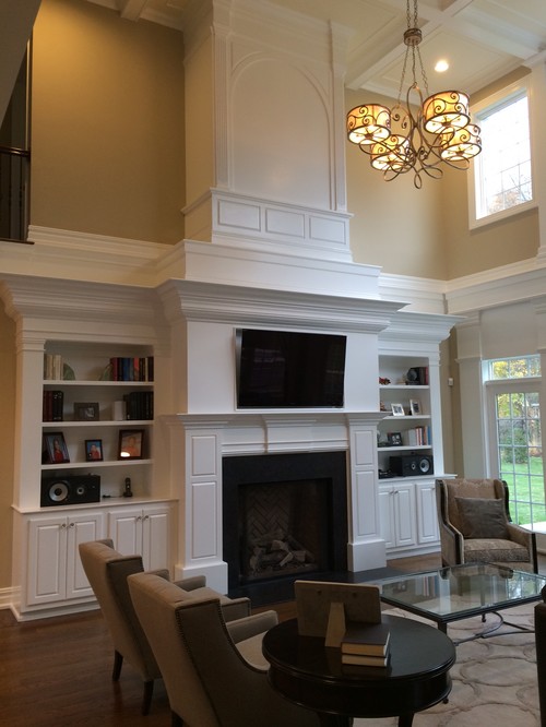 Two Story Fireplace and Built In Bookshelves