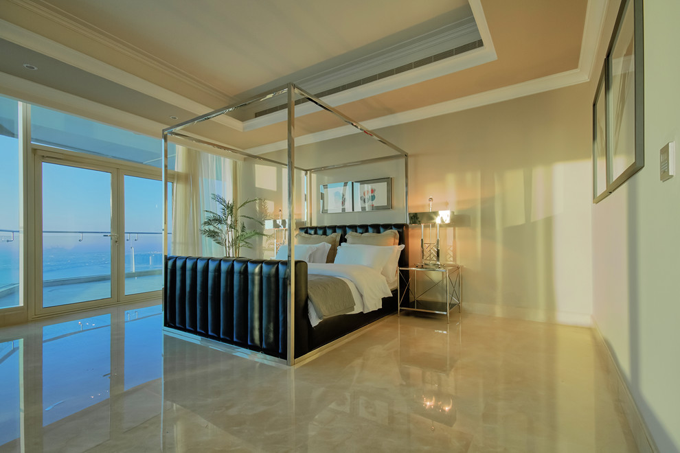 This is an example of an expansive contemporary master bedroom in Other with marble floors.