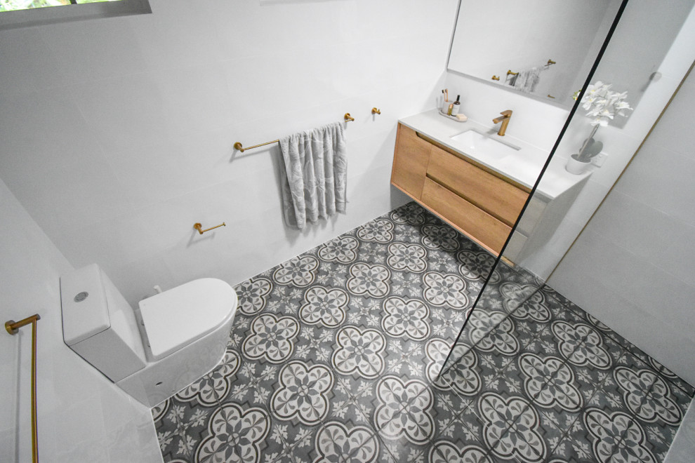 Photo of a mid-sized mediterranean bathroom in Gold Coast - Tweed with a floating vanity.