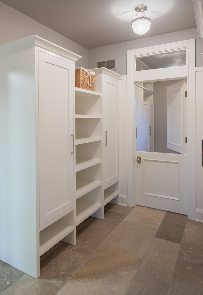 Photo of a transitional entryway in Grand Rapids with a dutch front door, a white front door and grey walls.