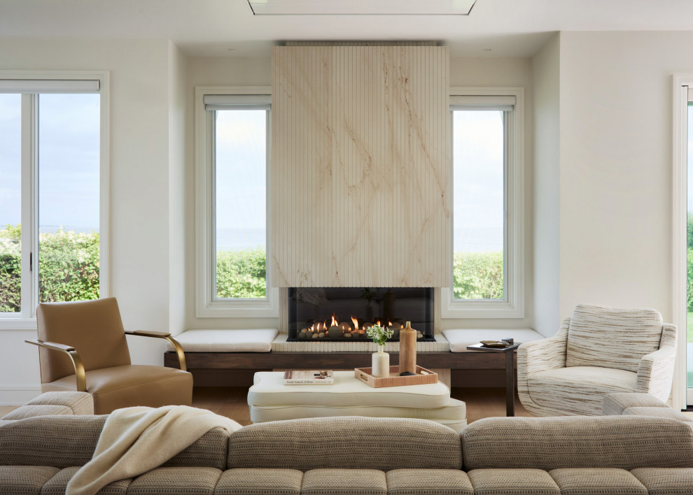 Mid-sized beach style open concept light wood floor and beige floor living room photo in Providence with white walls, a tile fireplace and a ribbon fireplace