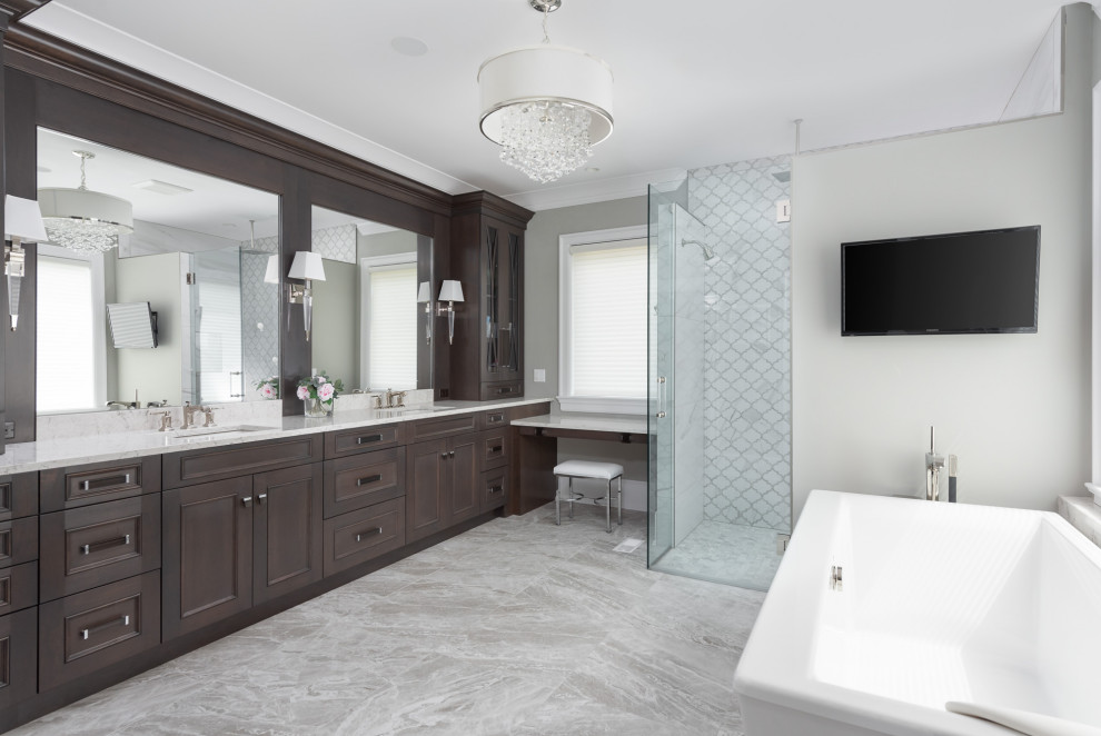 Transitional master gray tile and white tile gray floor and double-sink bathroom photo in Chicago with recessed-panel cabinets, dark wood cabinets, an undermount sink, marble countertops, a hinged shower door, multicolored countertops and a built-in vanity