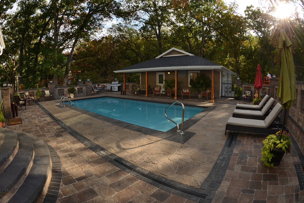 Home design - rustic backyard concrete paver home design idea