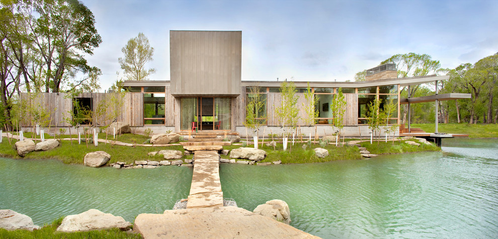 Example of a huge trendy exterior home design in Miami