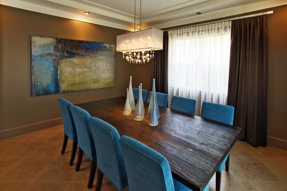 This is an example of a mid-sized modern separate dining room in Las Vegas with brown walls, ceramic floors, no fireplace and brown floor.