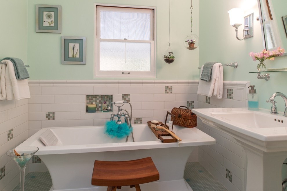 Inspiration for a small traditional master bathroom in San Diego with a freestanding tub, a one-piece toilet, white tile, subway tile, green walls, mosaic tile floors and a pedestal sink.