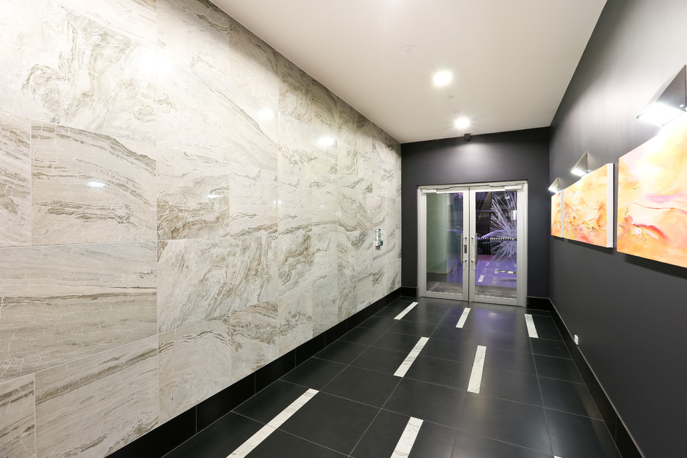 Photo of a contemporary entryway in Adelaide.