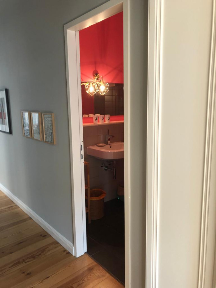 Small contemporary master bathroom in Other with red walls, a single vanity and a floating vanity.