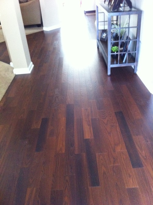 Hardwood Floor Layout in this sleekly modern kitchen with an open floor plan a white island with black Should I Do Hardwoods In The Foyer Area And Ceramic In The Kitchen My Concern About Using Ceramic In The Kitchen Is That I Think The Transition From Wood Hardwood Floor Layout hardwood floor layout Should I Do Hardwoods In The Foyer Area And Ceramic In The Kitchen My Concern About Using Ceramic In The Kitchen Is That I Think The Transition From Wood