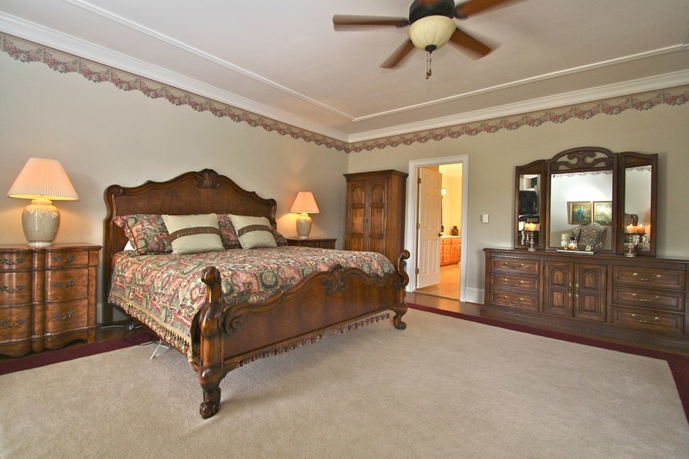 Example of a transitional bedroom design in Atlanta