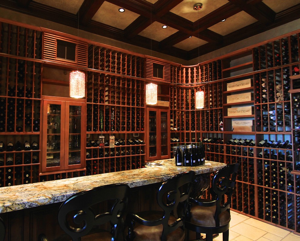 Photo of a mid-sized traditional wine cellar in Sacramento with limestone floors and storage racks.