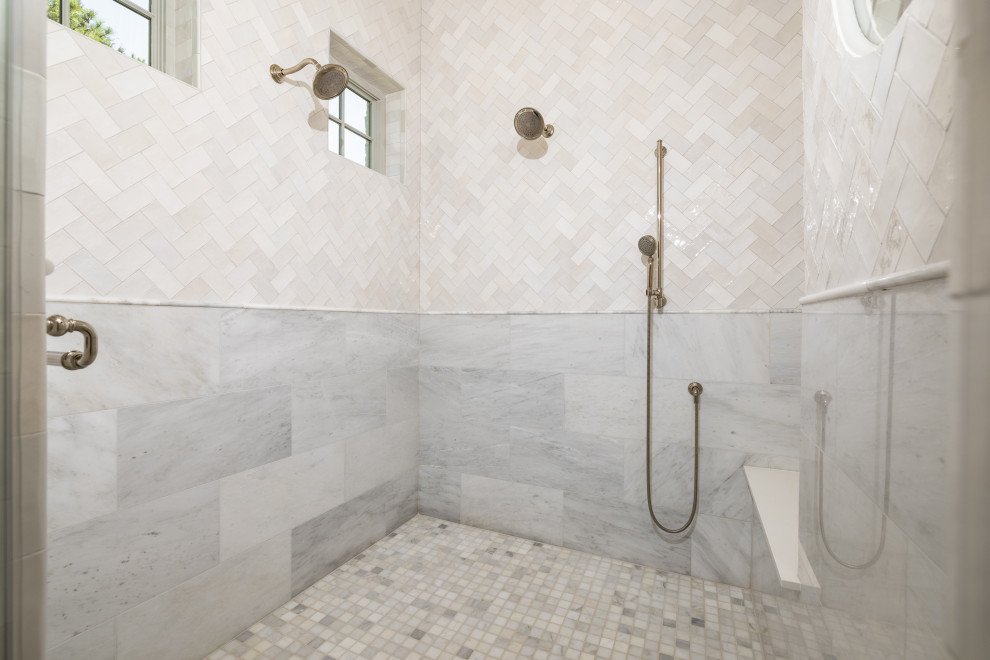 Inspiration for a large eclectic master mosaic tile floor and gray floor corner shower remodel in Houston with a built-in vanity