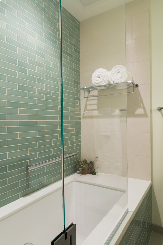 Photo of a transitional bathroom in San Francisco with engineered quartz benchtops, green tile and ceramic tile.