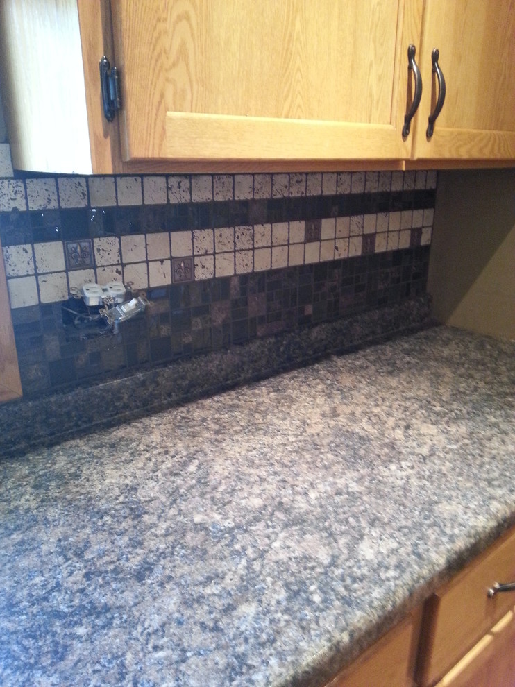 Inspiration for a rustic kitchen remodel with mosaic tile backsplash