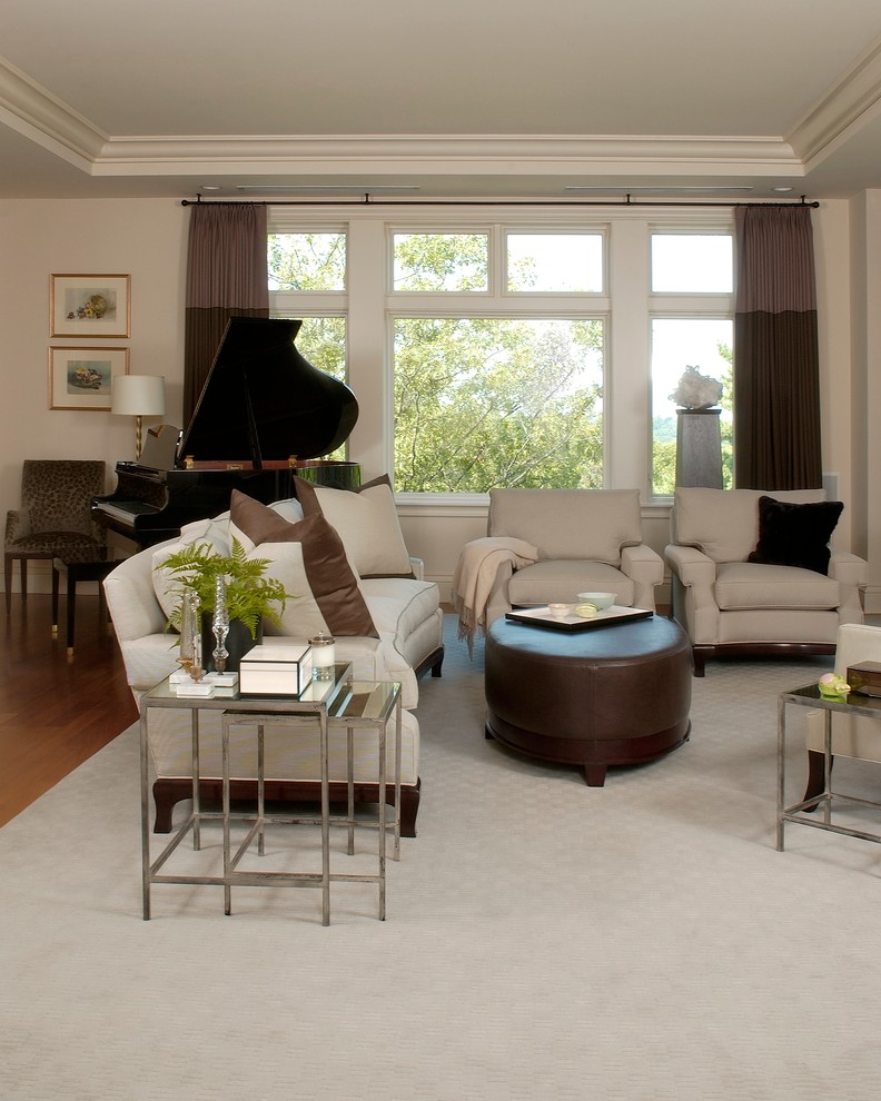 Transitional formal open concept living room in Boston with white walls and carpet.
