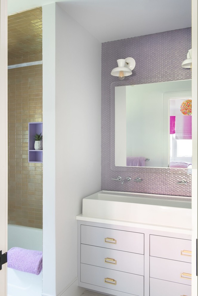 Design ideas for a mid-sized contemporary kids bathroom in New York with flat-panel cabinets, purple cabinets, a corner tub, a shower/bathtub combo, white walls, a trough sink, quartzite benchtops and white benchtops.