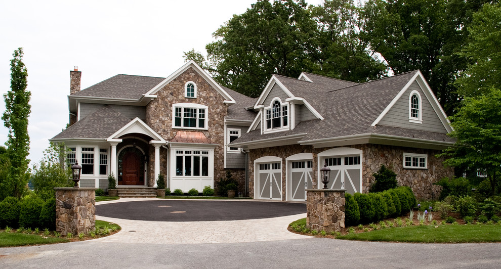 This is an example of a traditional exterior in Baltimore with stone veneer.