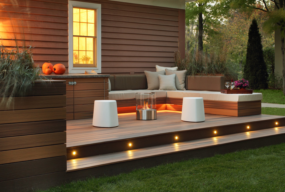This is an example of a transitional patio in Other with a fire feature.