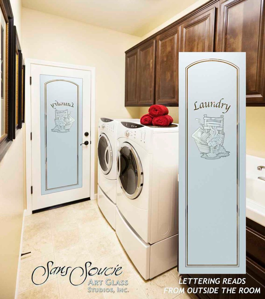 This is an example of a mid-sized eclectic single-wall dedicated laundry room in Other with a single-bowl sink, recessed-panel cabinets, dark wood cabinets, solid surface benchtops, beige walls, travertine floors and a side-by-side washer and dryer.