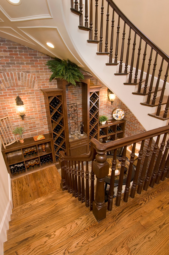 Inspiration for an expansive traditional wood curved staircase in Houston with wood railing.