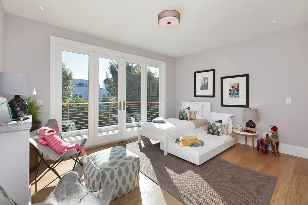 Waterfront remodel - Example of a bedroom transitional girl medium tone wood floor kids' bedroom design in San Francisco with gray walls