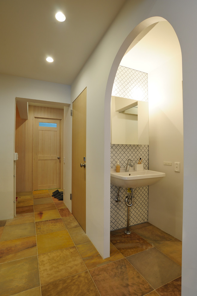 This is an example of a mediterranean powder room in Tokyo Suburbs.