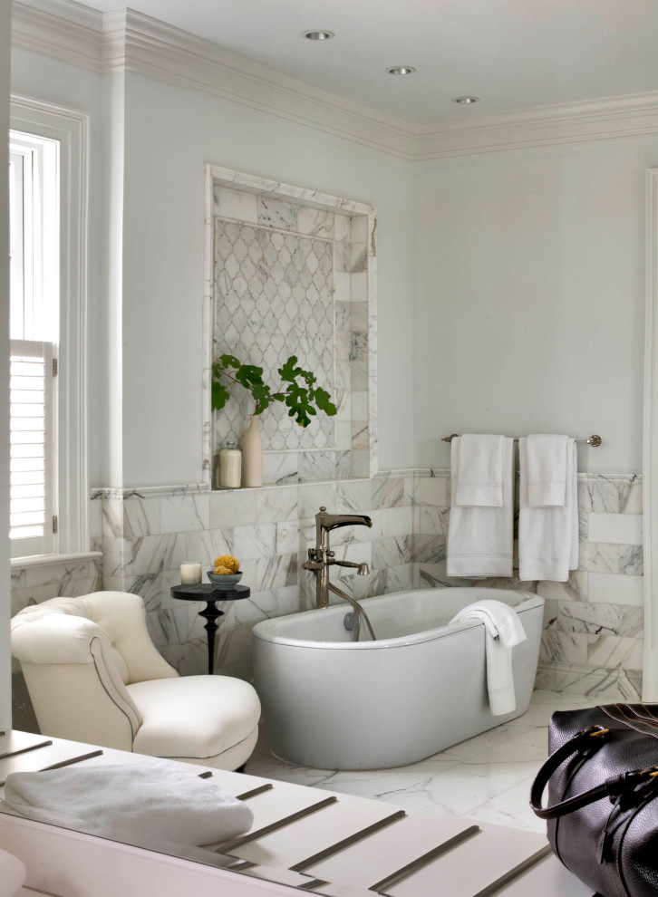 Inspiration for a large traditional master bathroom in Baltimore with grey cabinets, a freestanding tub, marble floors, grey floor, a double vanity and a freestanding vanity.