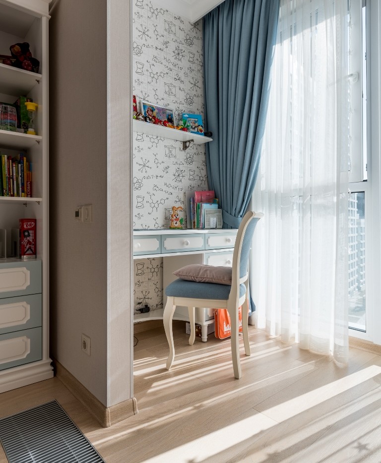 Inspiration for a transitional kids' study room for boys in Other with light hardwood floors.