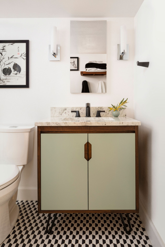 This is an example of a medium sized midcentury cloakroom in Denver with flat-panel cabinets, green cabinets, a one-piece toilet, white tiles, white walls, ceramic flooring, a submerged sink, engineered stone worktops, multi-coloured worktops and a freestanding vanity unit.