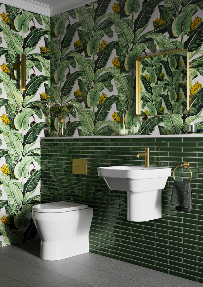 Idée de décoration pour une salle de bain minimaliste de taille moyenne pour enfant avec WC suspendus, un carrelage vert, un mur vert, un lavabo de ferme, un sol gris, un plan de toilette blanc, meuble simple vasque, du papier peint, des carreaux en allumettes et un sol en carrelage de porcelaine.