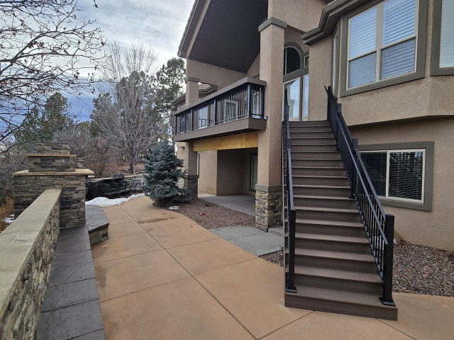 New composite deck with closed deck stairs contemporary-terrace