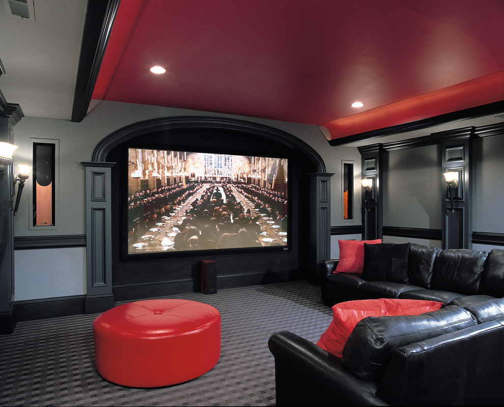 Design ideas for a traditional home theatre in San Francisco with a projector screen and grey floor.