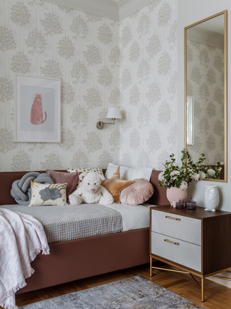 Photo of a large contemporary children’s room for girls in Moscow with beige walls, medium hardwood flooring, beige floors and wallpapered walls.
