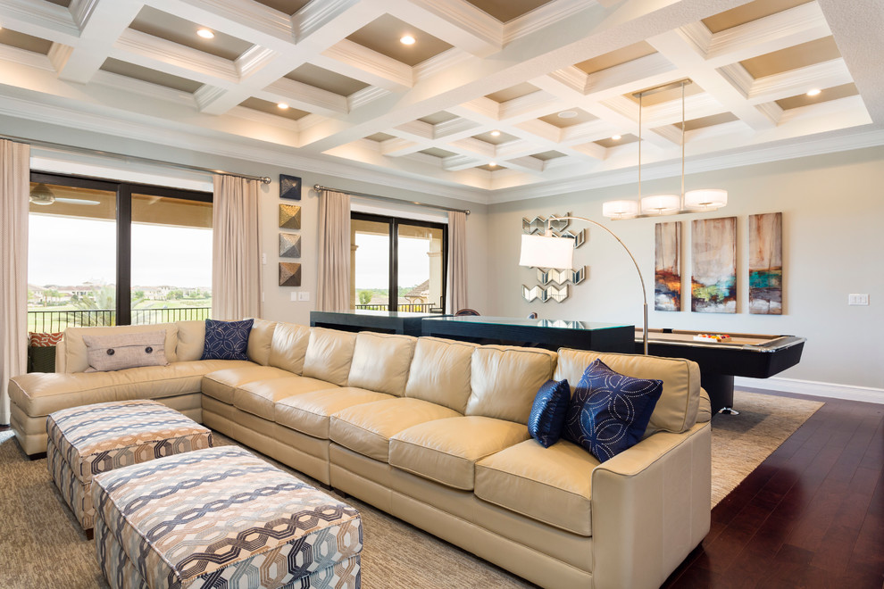 Photo of a contemporary open concept family room in Orlando with beige walls, porcelain floors and a built-in media wall.