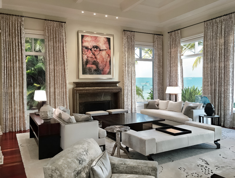 Design ideas for a large transitional formal enclosed living room in Miami with beige walls, dark hardwood floors, a standard fireplace, a stone fireplace surround, no tv and brown floor.