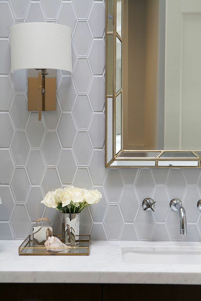 Small modern master bathroom in San Francisco with an undermount sink, flat-panel cabinets, dark wood cabinets, marble benchtops, an undermount tub, a corner shower, a wall-mount toilet, gray tile, ceramic tile, grey walls and porcelain floors.