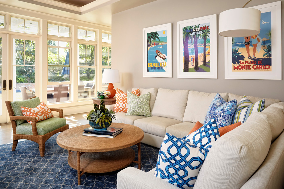 Inspiration for a large coastal open concept light wood floor and beige floor living room remodel in San Diego with gray walls, no fireplace and no tv