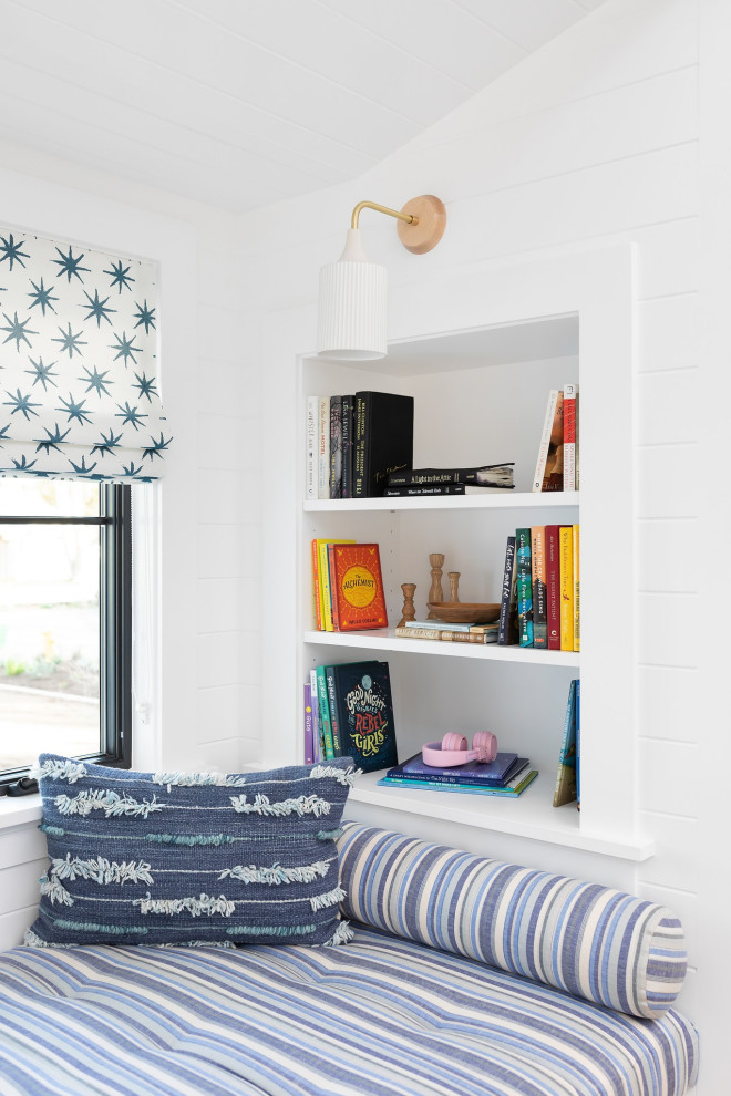 Photo of a small rural gender neutral kids' bedroom in Orange County with white walls, light hardwood flooring, brown floors, a timber clad ceiling, tongue and groove walls and feature lighting.