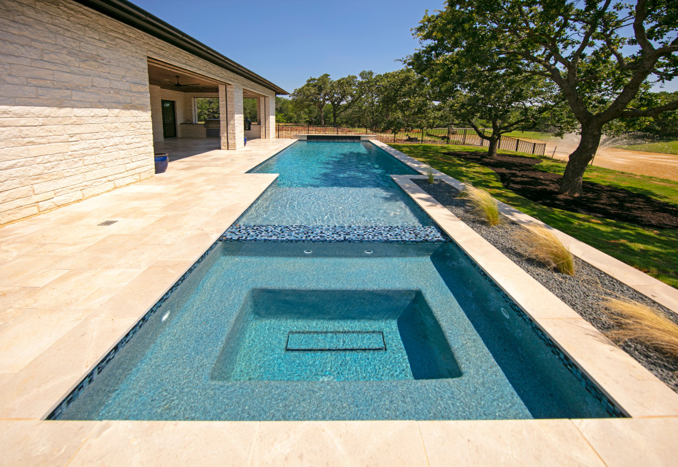 Inspiration for a huge transitional two-story white pool remodel in Dallas