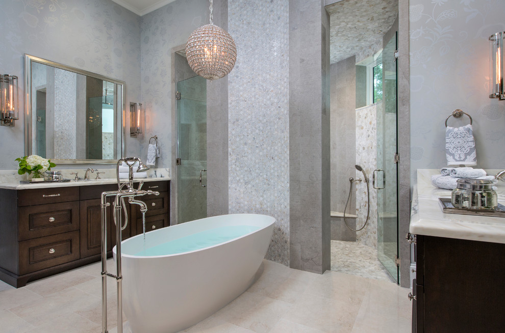 Design ideas for a mid-sized contemporary master bathroom in Jacksonville with beaded inset cabinets, dark wood cabinets, a freestanding tub, a double shower, beige tile, gray tile, stone tile, purple walls, travertine floors, an undermount sink and engineered quartz benchtops.