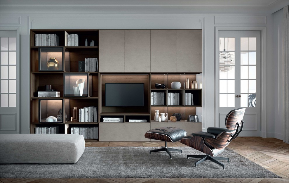 Design ideas for a large modern loft-style living room in Milan with a library and concrete floors.