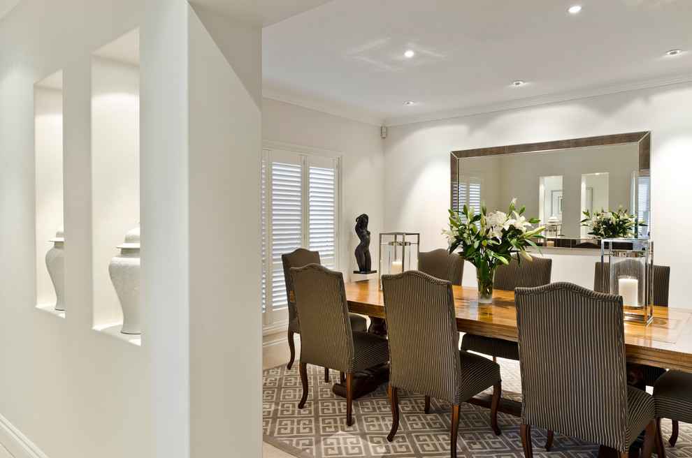 Photo of a transitional dining room in Brisbane.