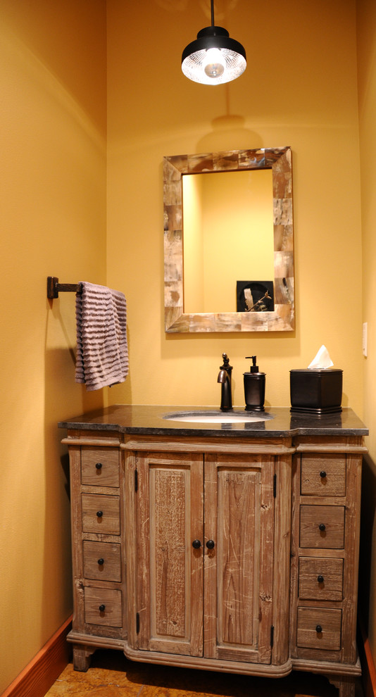 Bathroom - small rustic travertine floor bathroom idea with yellow walls