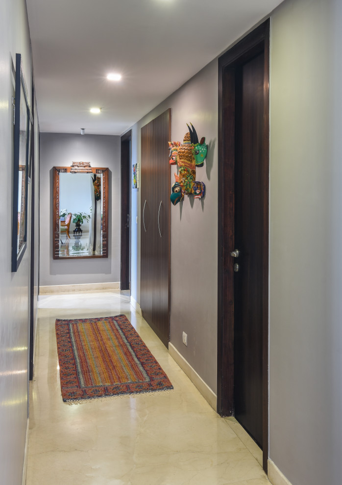 Inspiration for a transitional hallway in Bengaluru.