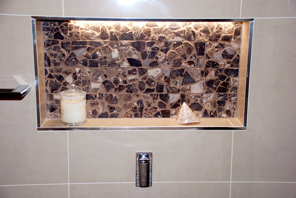 Mid-sized contemporary master bathroom in Melbourne with brown tile, pebble tile and beige walls.