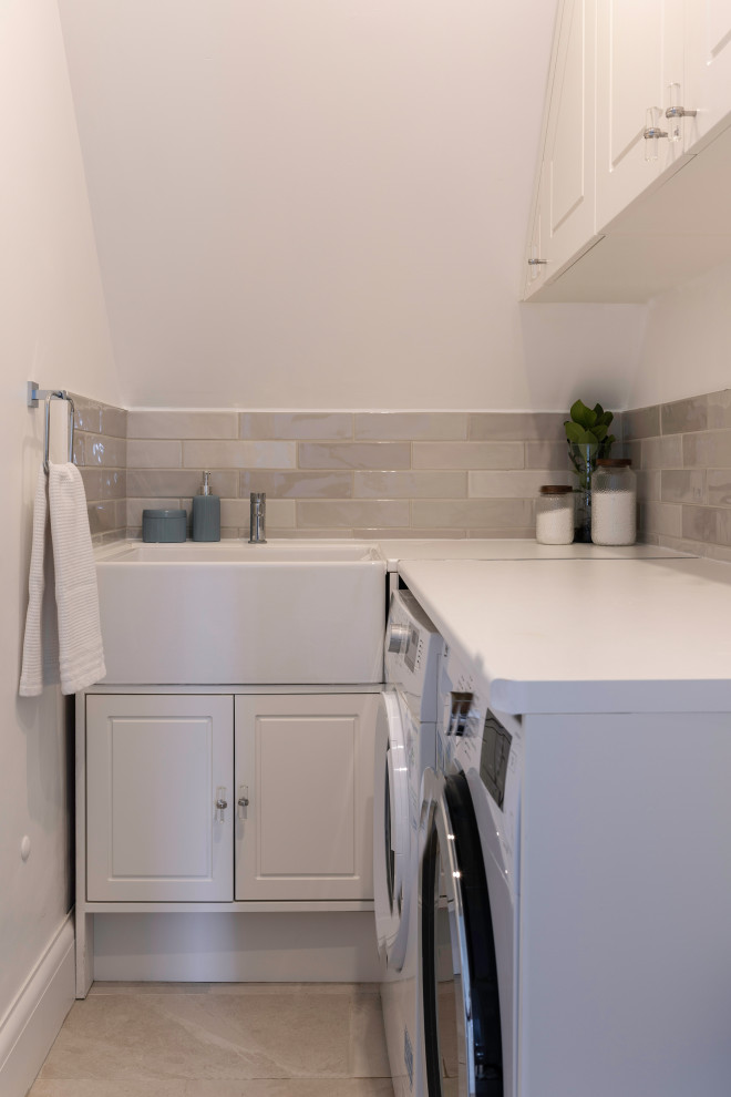 Inspiration for a large transitional laundry room remodel in Essex